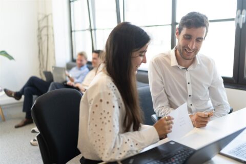 Team working and laughing