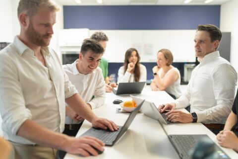 Team working on a whiteboard